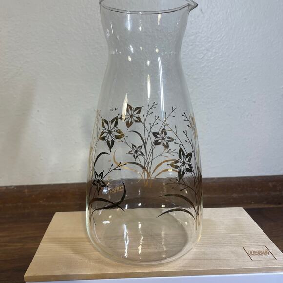 Vintage Pyrex Glass Juice Carafe Gold Floral Design 9.75" high 48oz - Picture 1 of 9